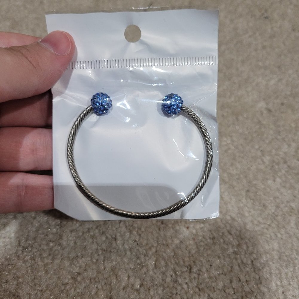free in bundle over $30.  Bracelet with blue gems